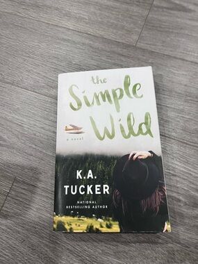 The Simple Wild by K.A. Tucker - White & Green Paperback Novel